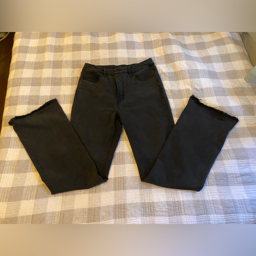 Good American distressed black flare jeans